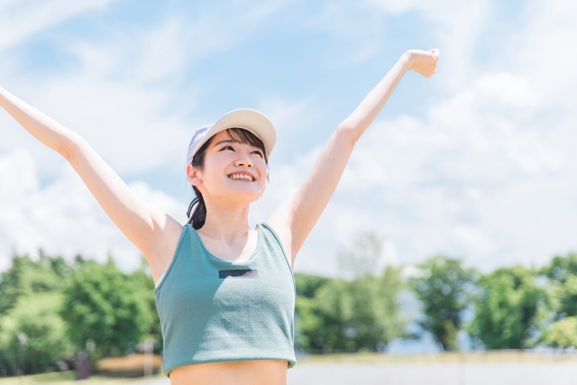 運動 女性 笑顔